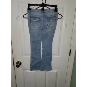 Squeeze Light Wash Flare Jeans – Waist is 24 inseam is 22inches